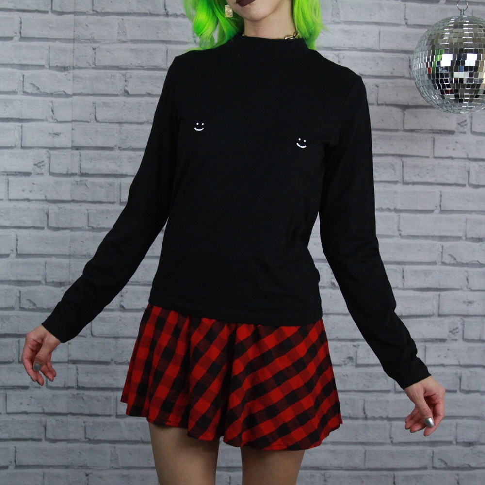 Smiley nipple mock neck top
